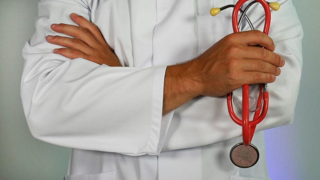 Dr. Schirippa in a white coat with a stethoscope, representing clinical nutrition care